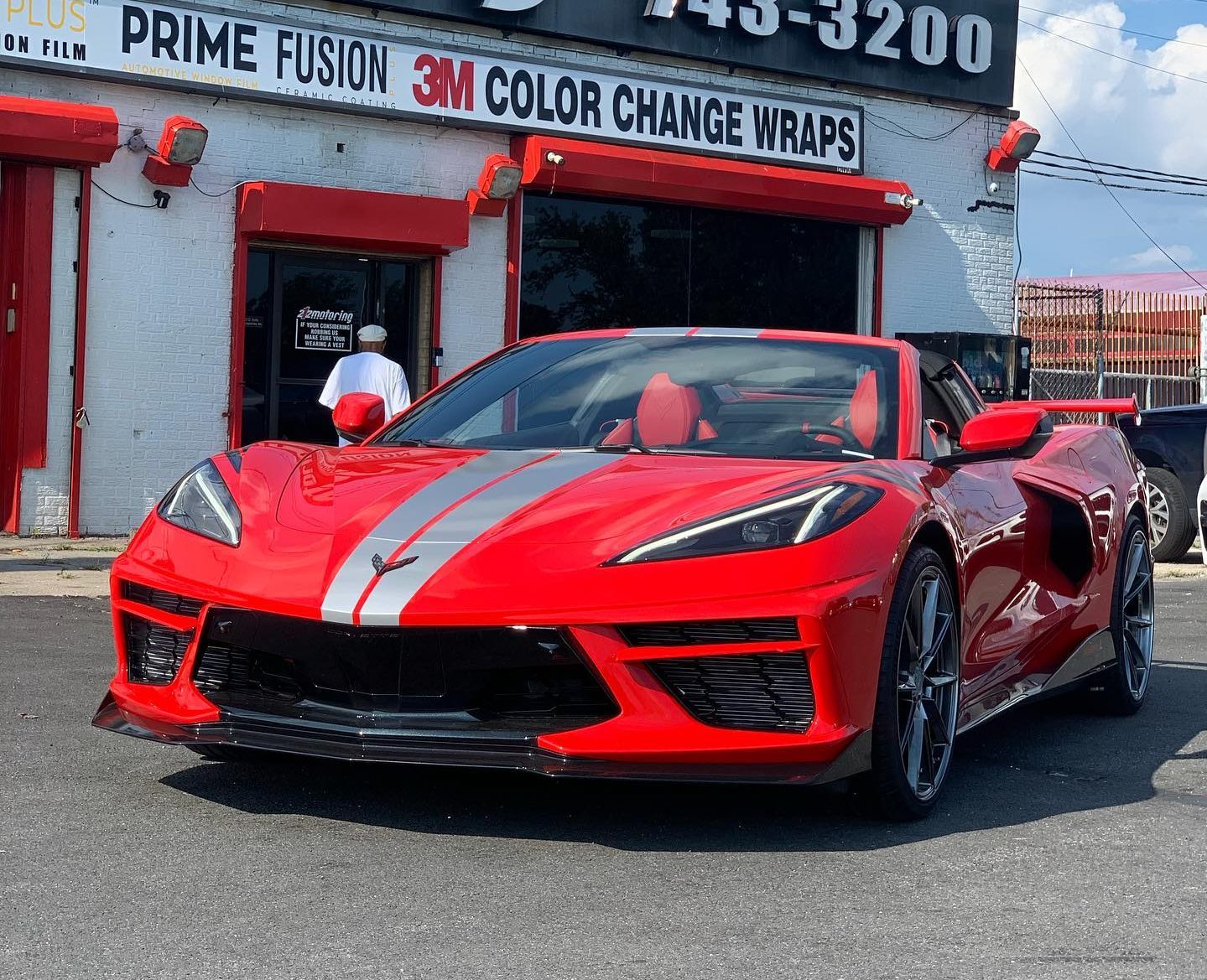 Red Corvette with two silver stripes