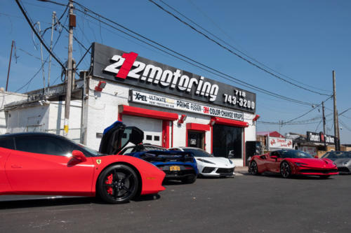 Four sports cars outside of 212 Motoring