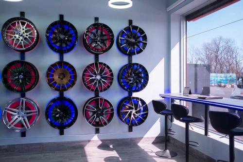 Interior of the 212 Motoring shop: Some custom tire rims